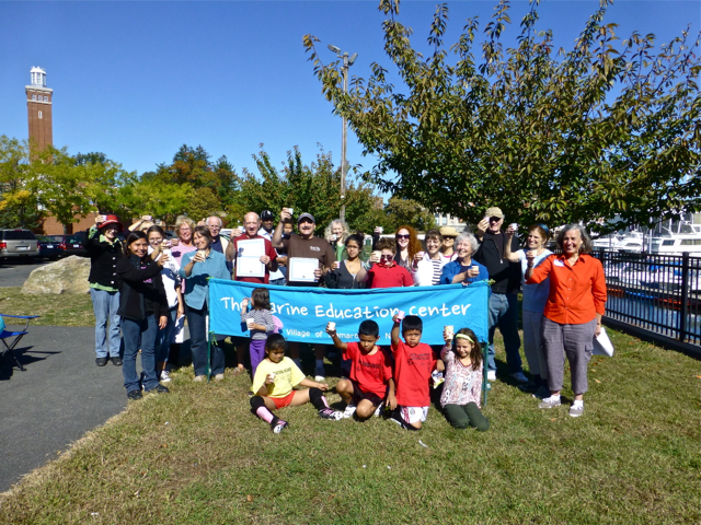 The Village of Mamaroneck raises their glasses at the Marine Education Center at Harbor Island Park. Here's a picture of everybody, glasses & paper cups held high, on a beautiful morning in Mamaroneck Harbor, wishing all the Estuaries in the USA... CLEAN WATER!