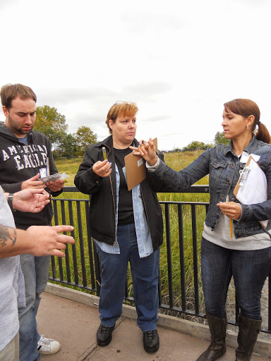 NYC middle school teachers at the "Climate Change and the Long Island Sound Estuary" teacher workshop that was held on October 2, 2014 test the water quality of Alley Pond Creek. Alley Pond Creek flows into Little Neck Bay, which discharges to Long Island Sound. 