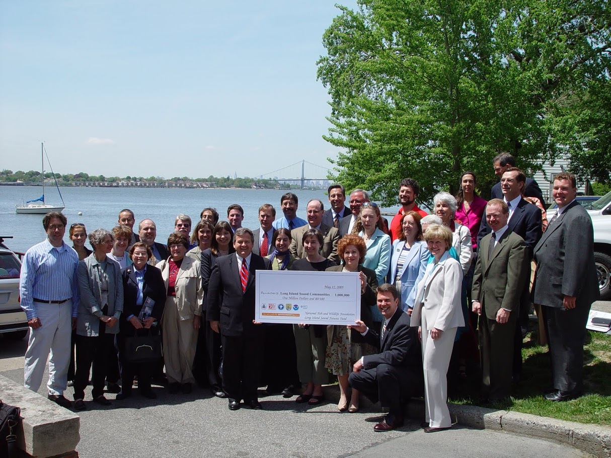 Recipients of the first Long Island Sound Futures Grant awards in 2005 pose with state and federal environmental officials in front of a ceremonial $1 million check.