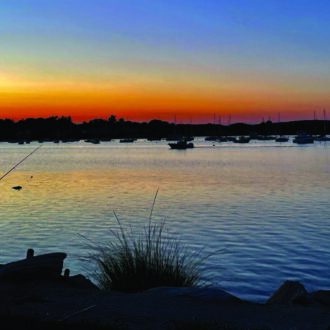 An angler fishing on North Cove in Old Saybrook, CT. Turn to page 2 to learn how BIL funds will be used to reach out to non-English speakers for the state's annual angler survey.