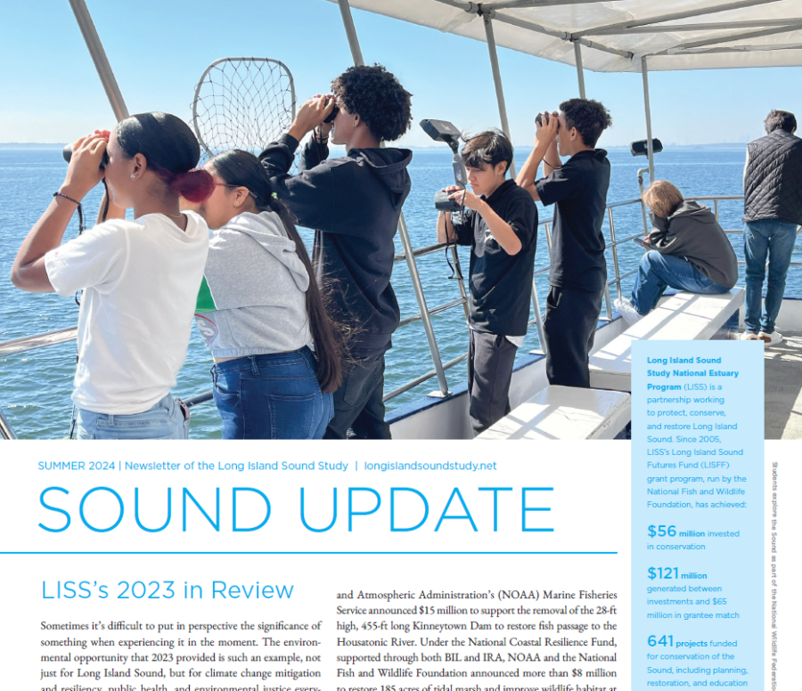 Cover page of the Sound Update newsletter, which includes an image of students looking out to the water with binoculars.